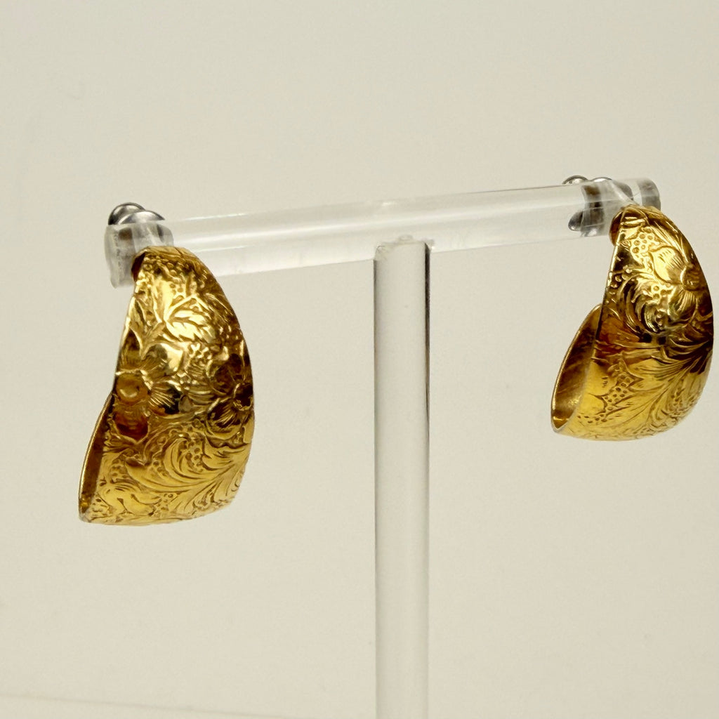 Gold tone floral design hoop earrings