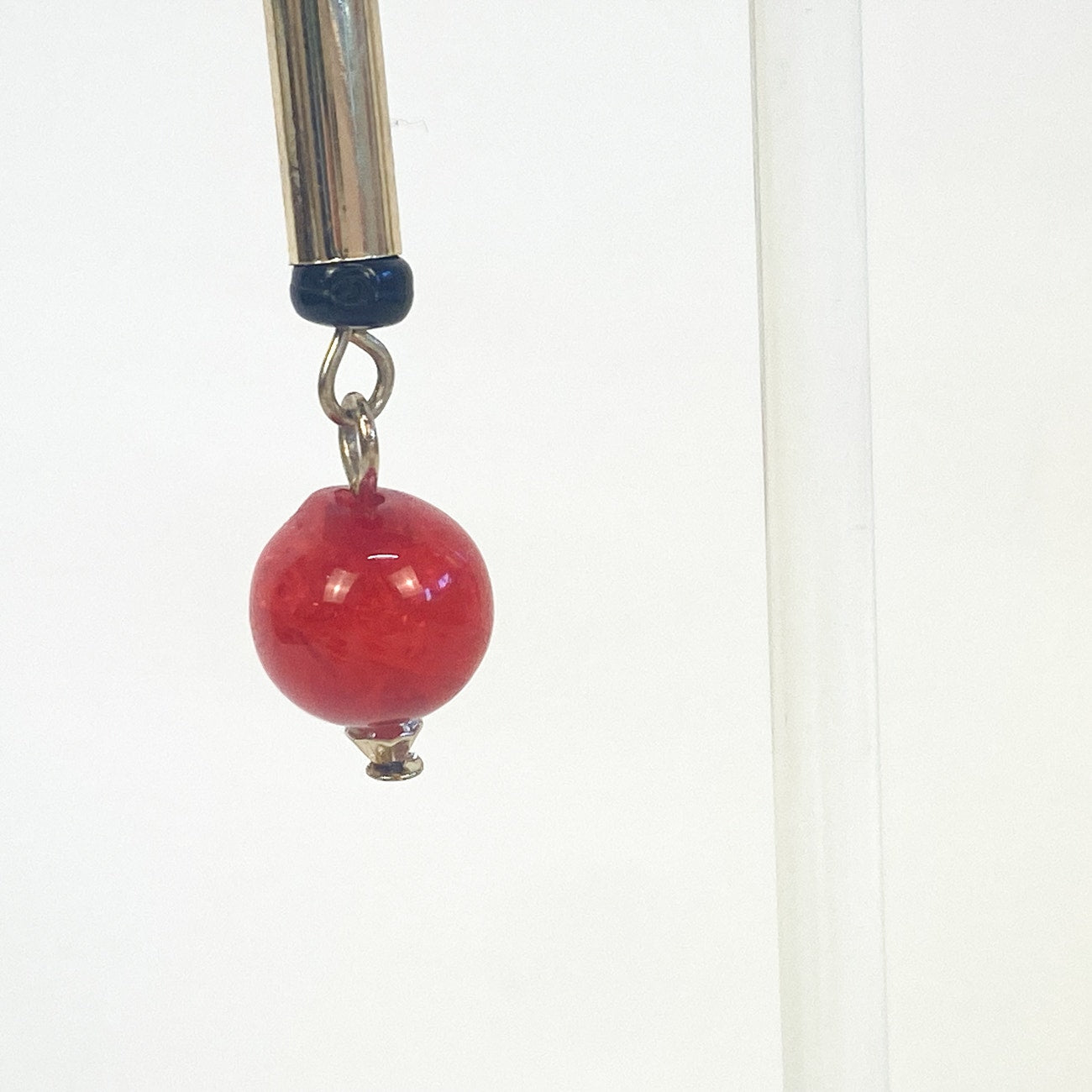 Gold and Red Dangly Earrings with Black Accents