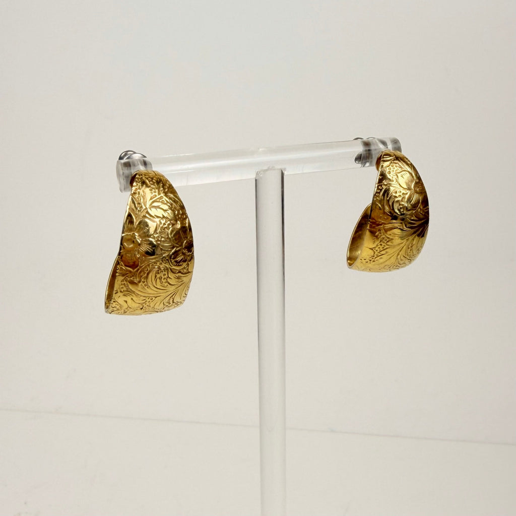 Gold tone floral design hoop earrings