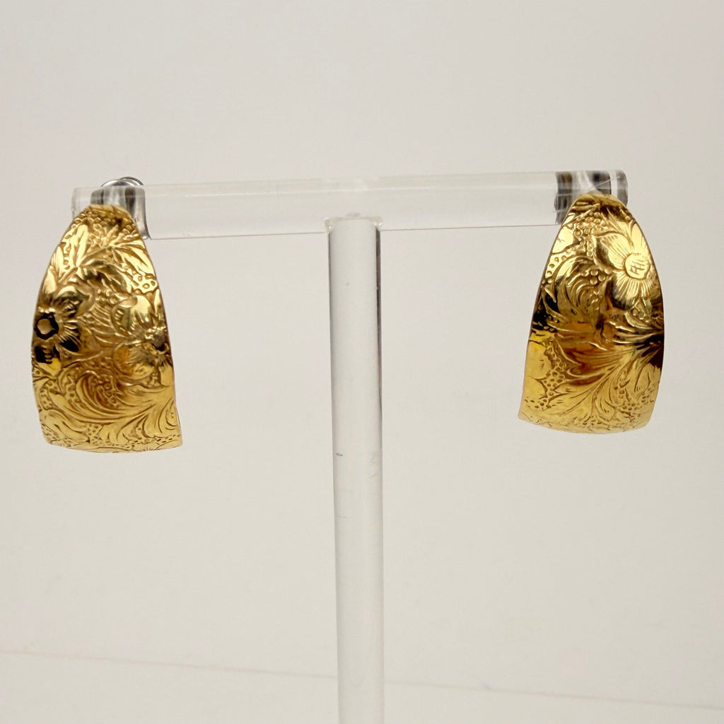 Gold tone floral design hoop earrings