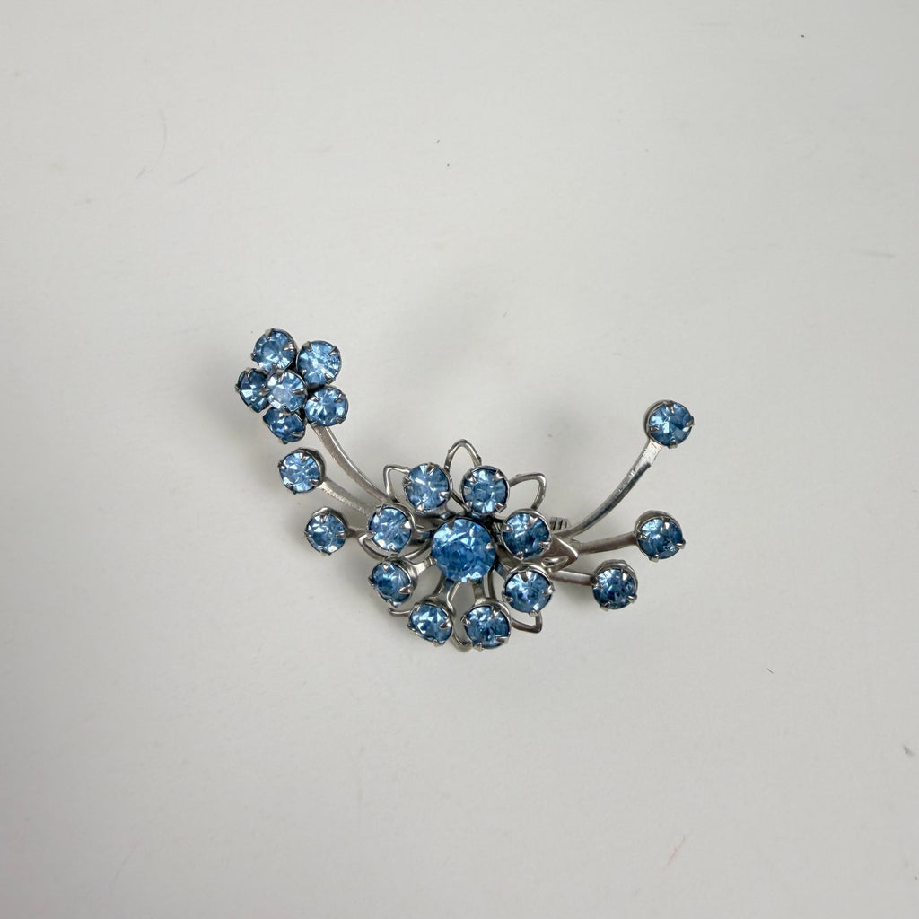 Silvery Floral Brooch with Blue Rhinestones